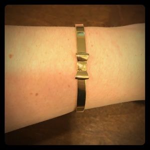Gold bow KATE SPADE bangle